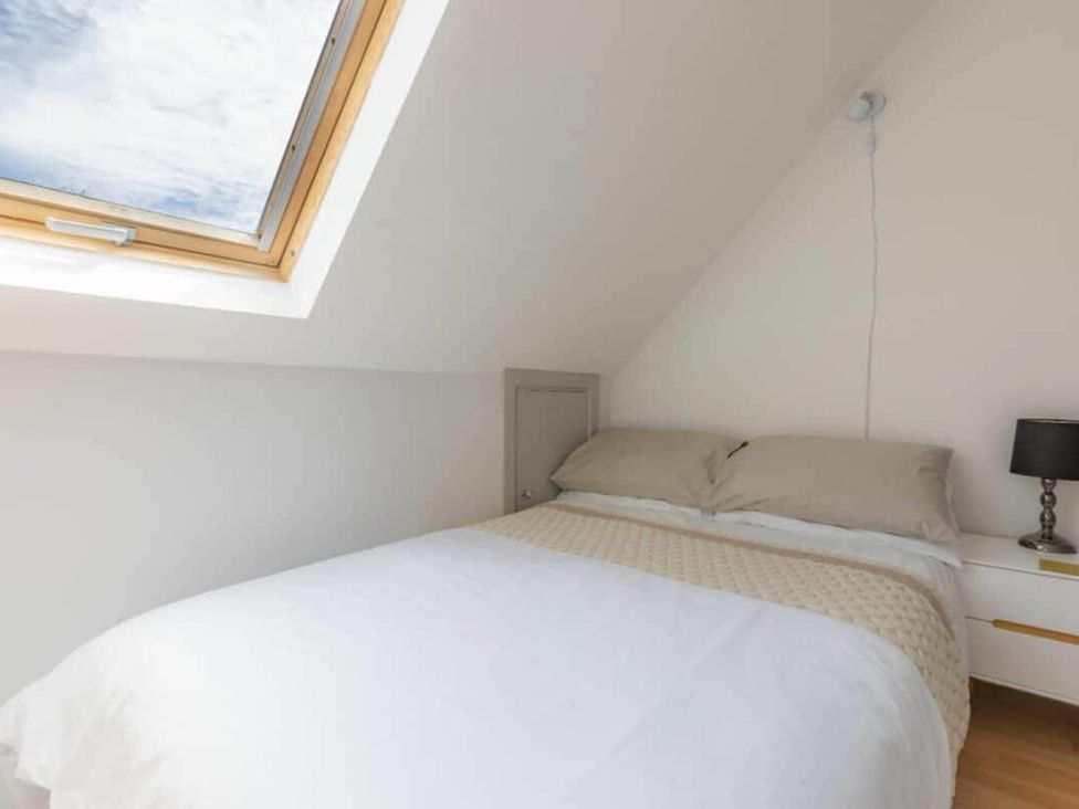 A bedroom with a bed and skylight at 2 Bedrooms overlooking Little Petherick Creek Little Petherick