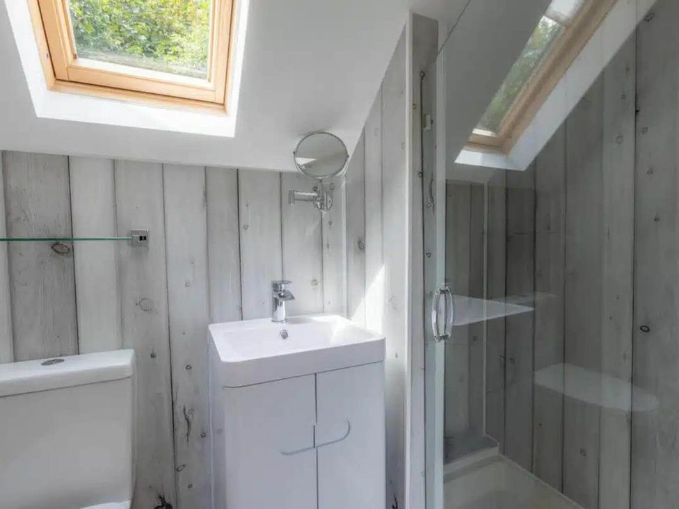 A bathroom with a shower and sink at 2 Bedrooms overlooking Little Petherick Creek in Little Petherick