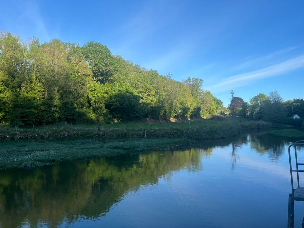 A river with trees along the bank at 2 Bedrooms overlooking Little Petherick Creek Little Petherick