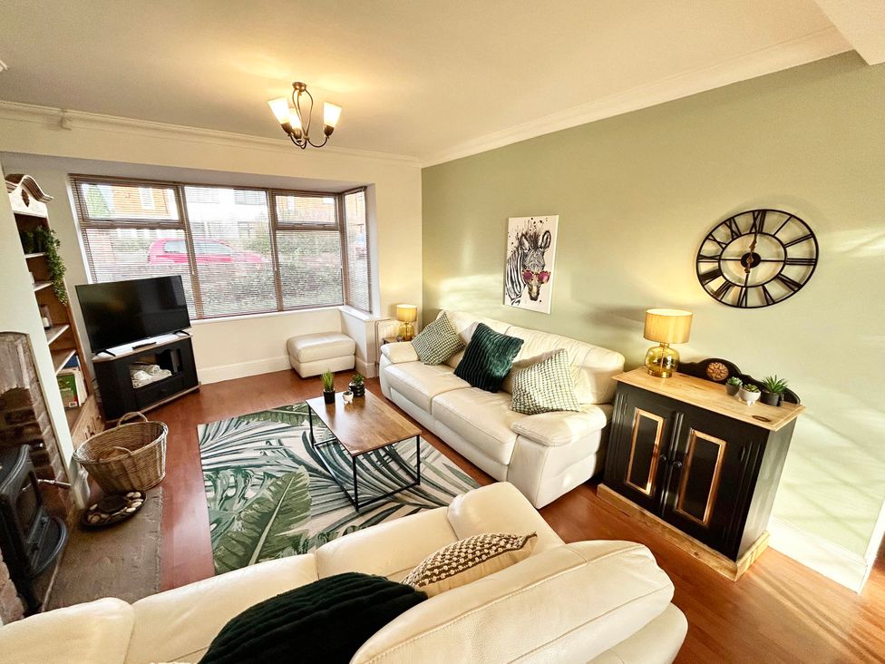 A living room with a television and sofa at 6 Guests 3Bed House in Chester le Street