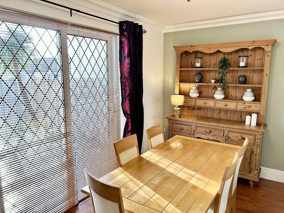A dining room with a table and chairs at 6 Guests 3Bed House in Chester le Street