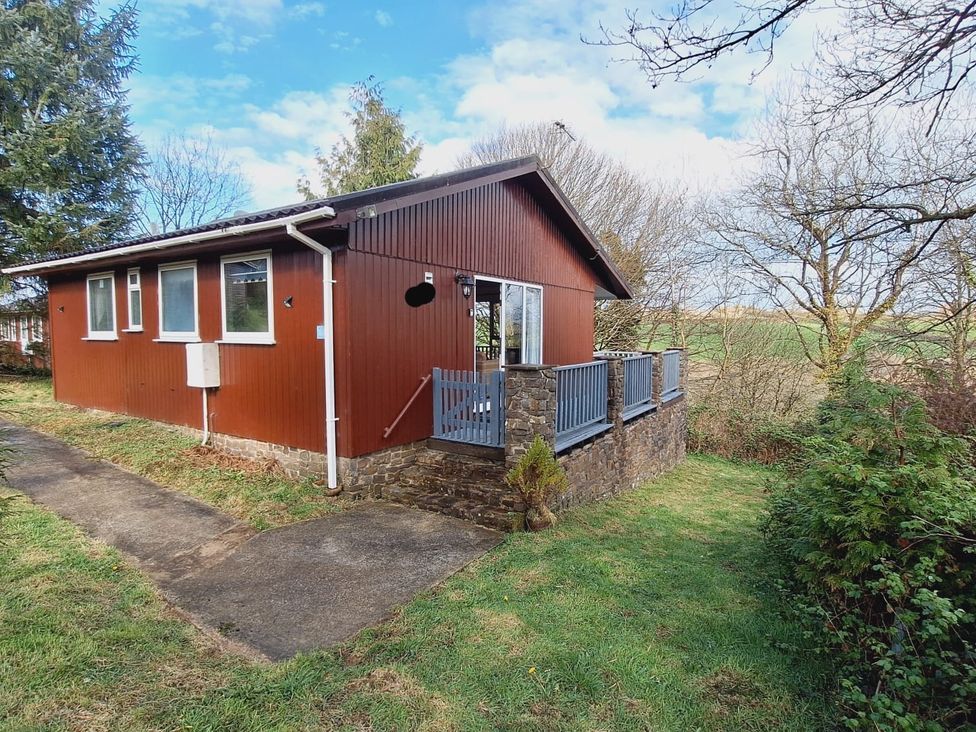 A house with a deck and windows in Woolsery near Bideford