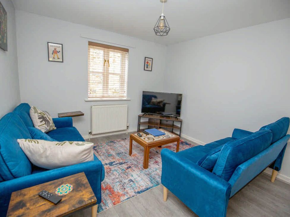 A living room with two sofas and a coffee table at House Sleeps 4 with Parking and Garden, Glastonbury