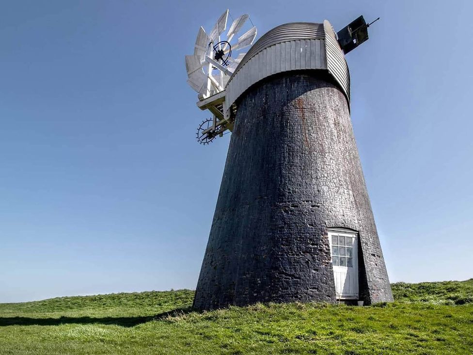 A windmill on grass at 1880s Barn Conversion Sleeps4 Pet Friendly Hereford
