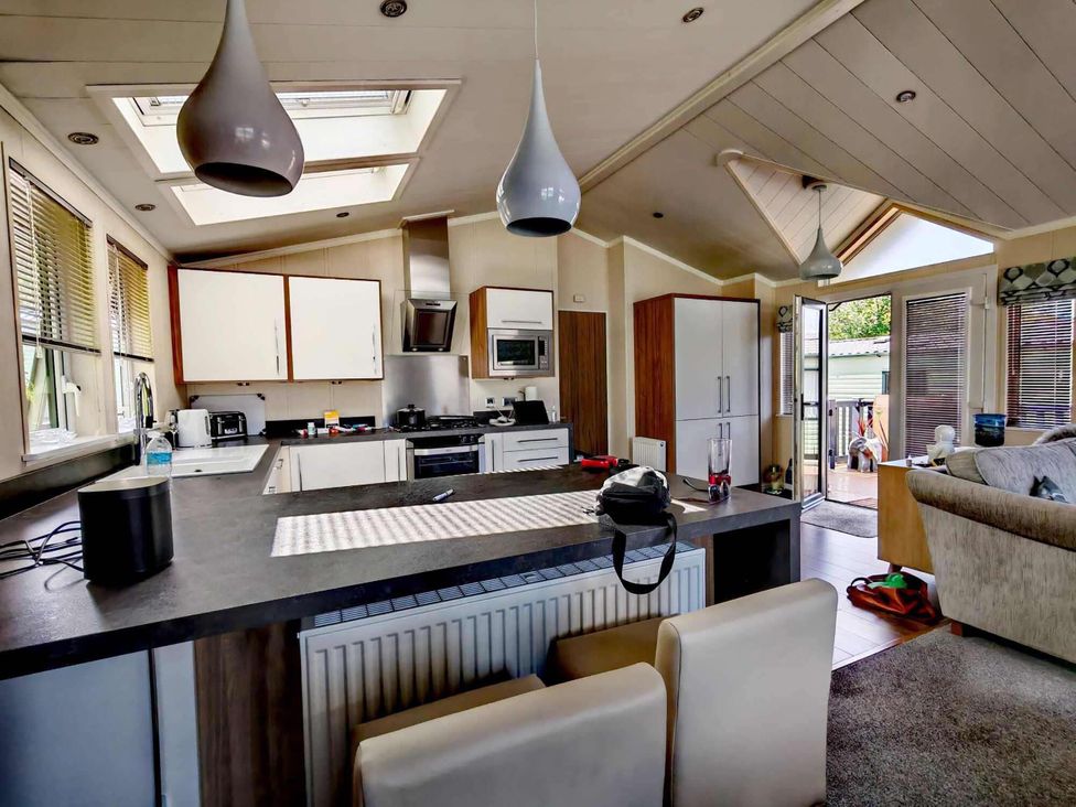 A kitchen with cabinets and appliances at Dunoon 3Bed Lodge Sleeps 6 Pet Friendly near Dunoon