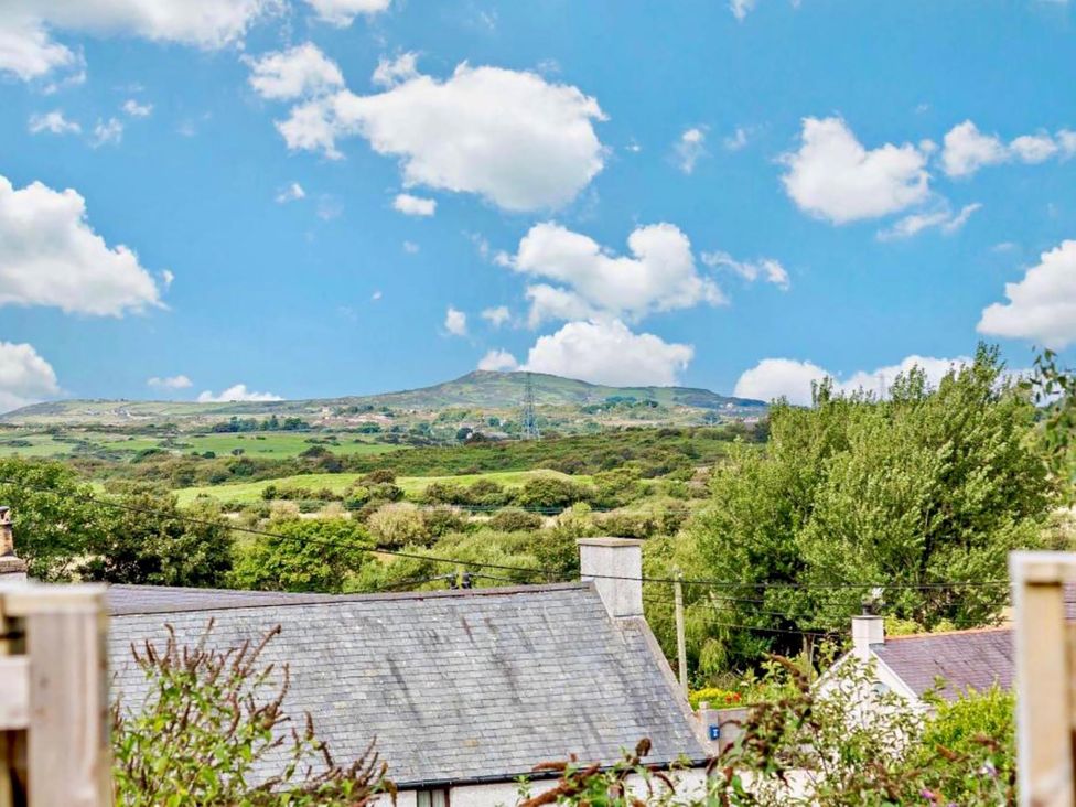 A view of a mountain and greenery at Cottage Sleeps 5 with Parking and Garden in Carreglefn