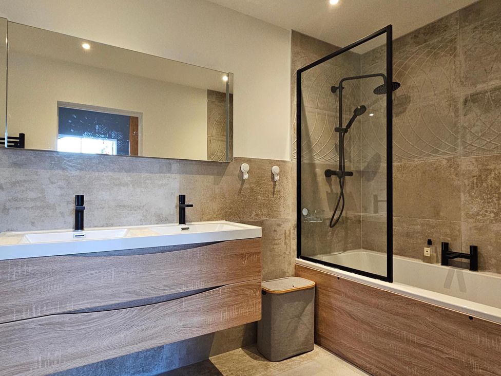 A bathroom with a sink and shower at Luxury Kent Bungalow Retreat Sleeps 12 in Cross-at-Hand near Staplehurst