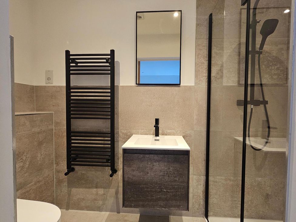 A bathroom with a shower and sink at Luxury Kent Bungalow Retreat Sleeps 12 in Cross-at-Hand near Staplehurst