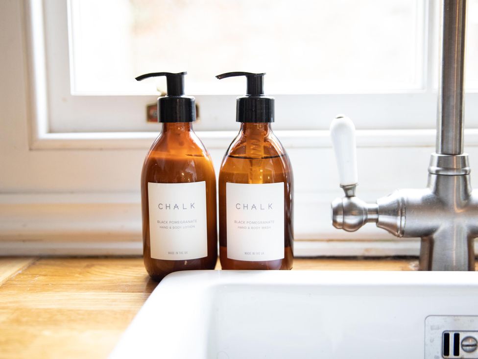 Hand soap and body lotion on a sink at York Minster 3bed Sleeps 6 Fireplace Free Parking, York