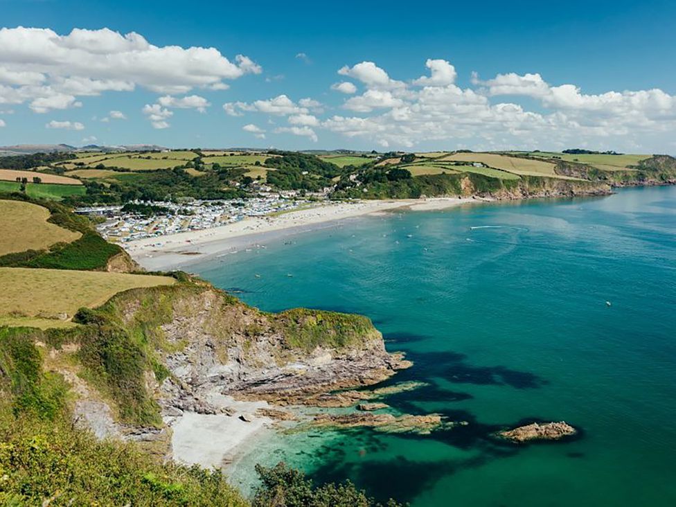 A coastal view with beach and sea at a location in Builth Wells