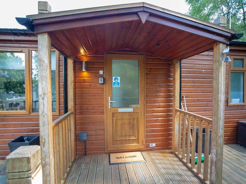An entrance with a door and welcome mat at Felmoor Park Northumberland Lodge with Hot Tub Felmoor Park near Felton