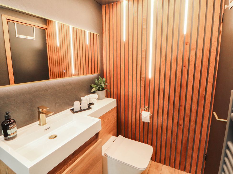 A bathroom with sink and toilet at Fourways