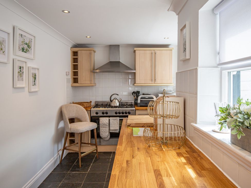 A kitchen with an oven and countertop at Hudson House