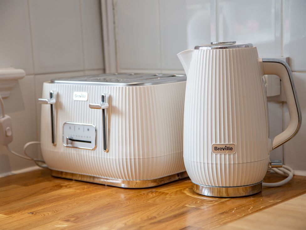 A kettle and toaster on a countertop at Hudson House in 