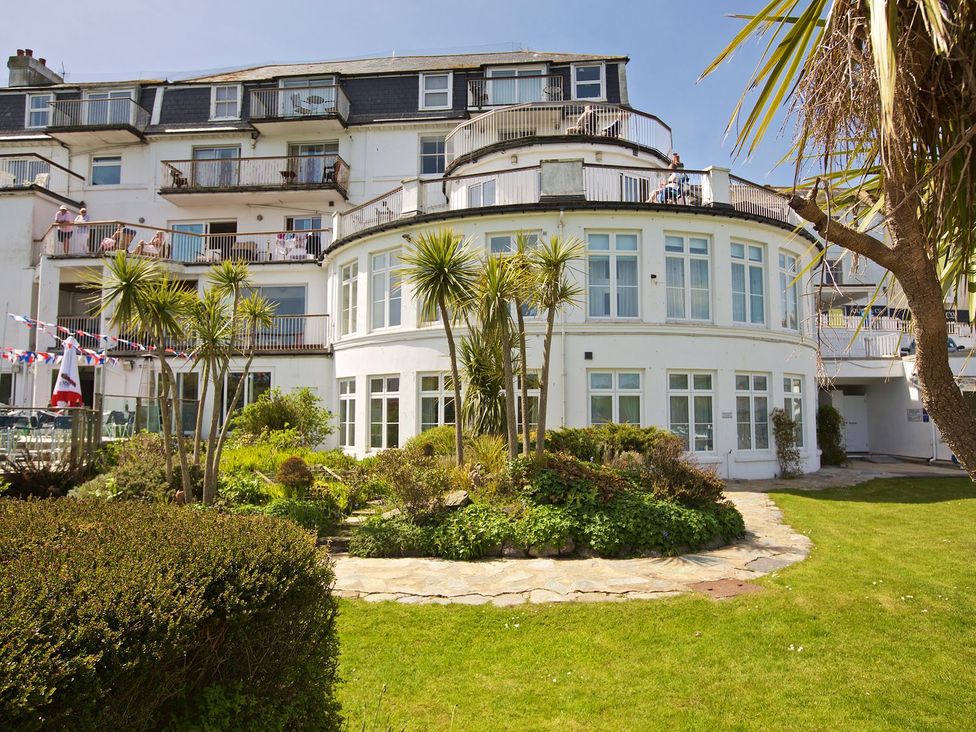 A building with balconies and gardens at 4 The Salcombe, Salcombe