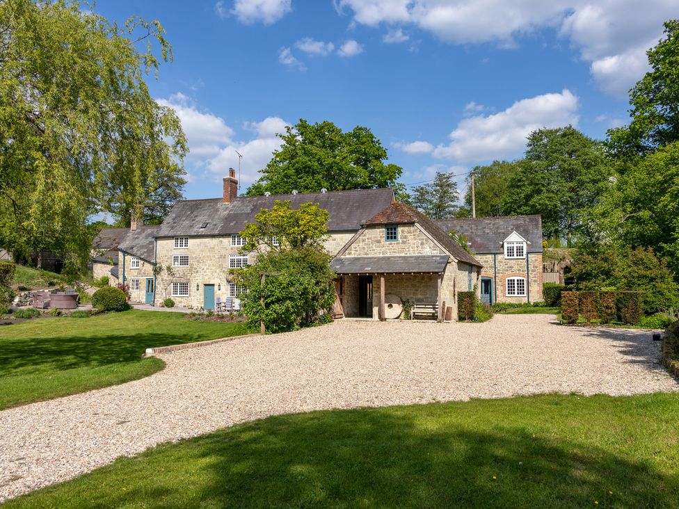 A house surrounded by garden and trees at French Mill in Shaftesbury