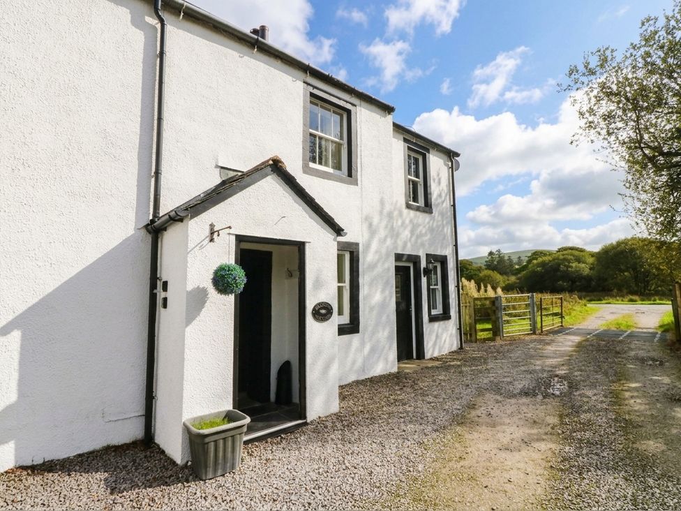 An exterior view of a house with a gravel pathway at Bramble near Cleator Moor