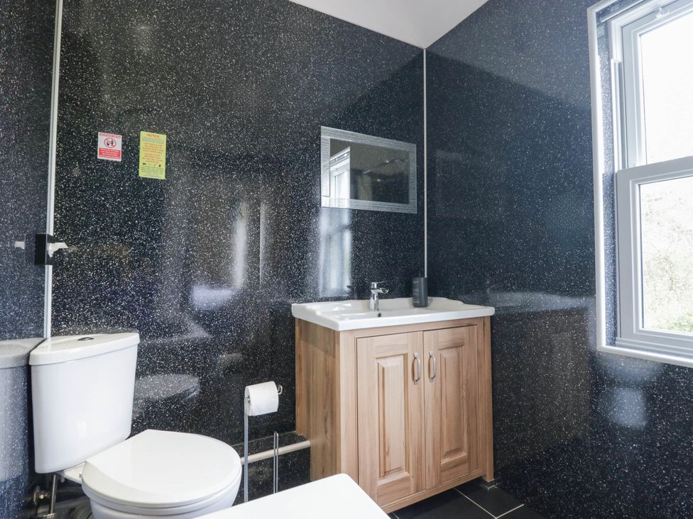 A bathroom with a sink and toilet at Bramble near Cleator Moor