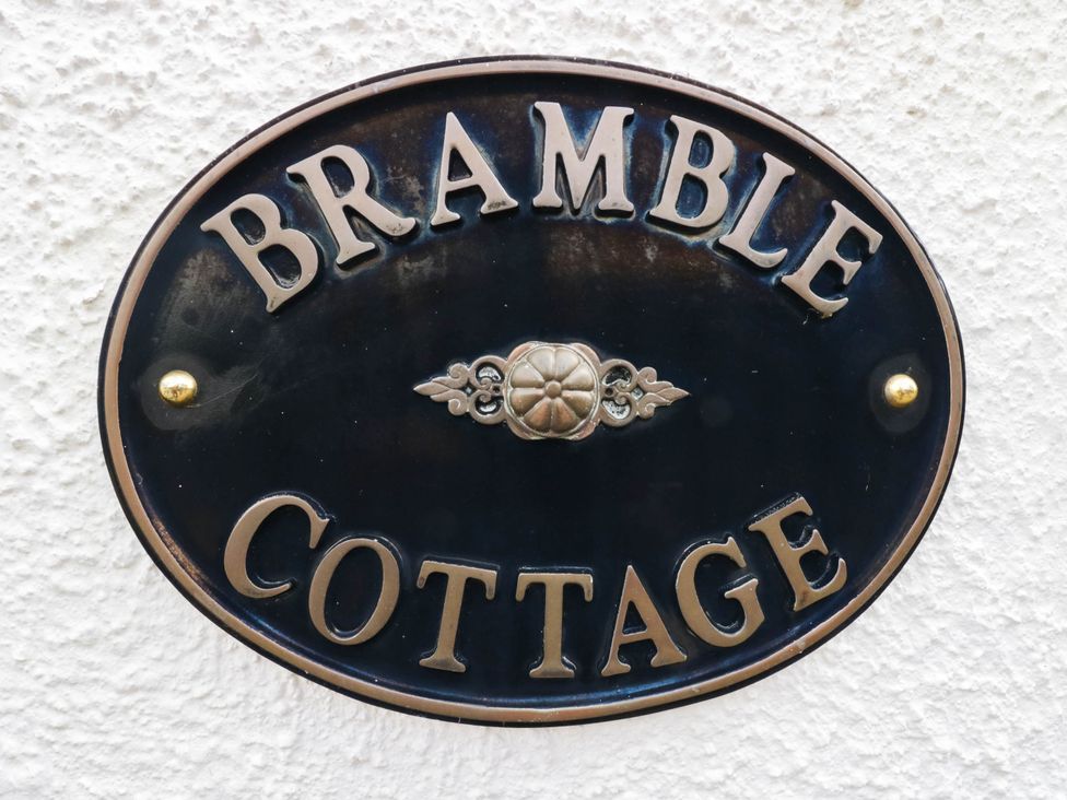 A nameplate indicating Bramble Cottage on a wall near Cleator Moor