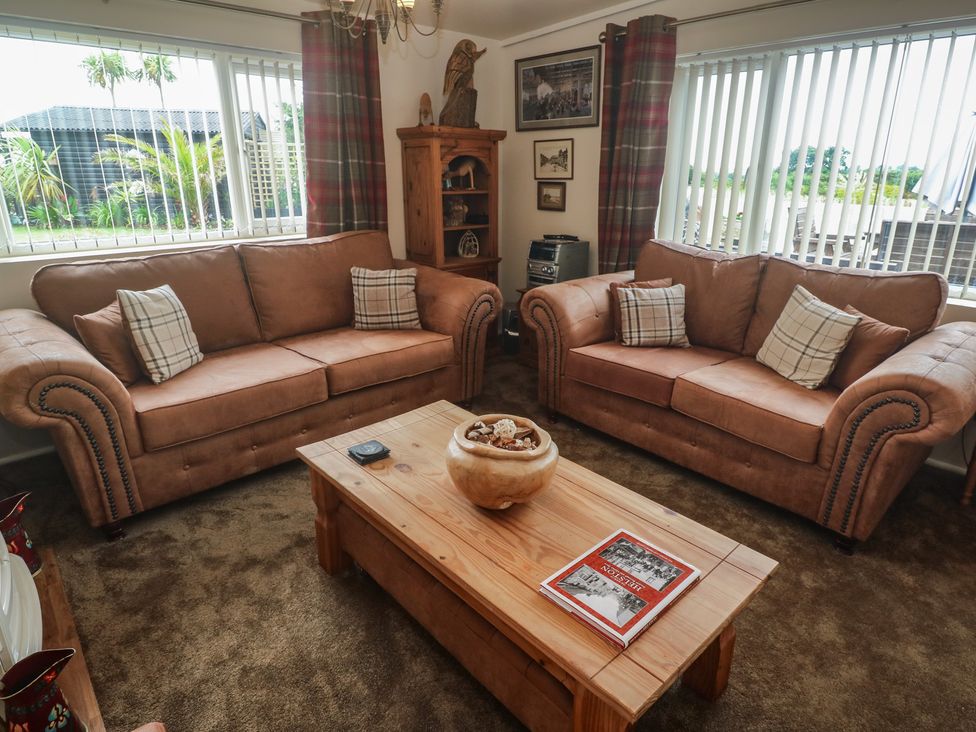 A living room with two sofas and a coffee table at The Hideaway at Monterey Helston