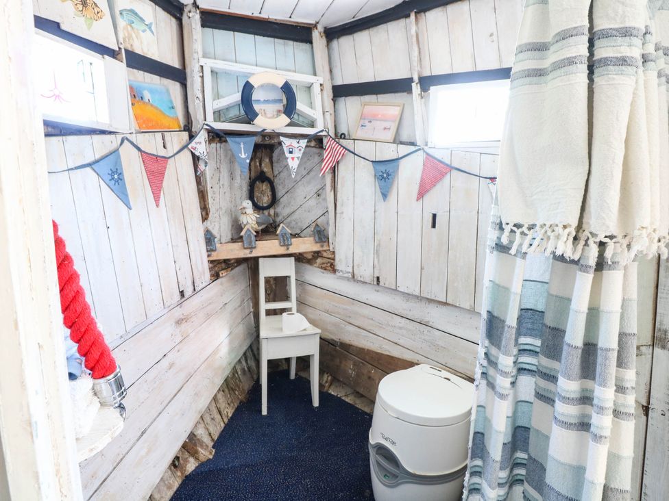A bathroom with a toilet and sink at Ladies of Bolton in Horsford