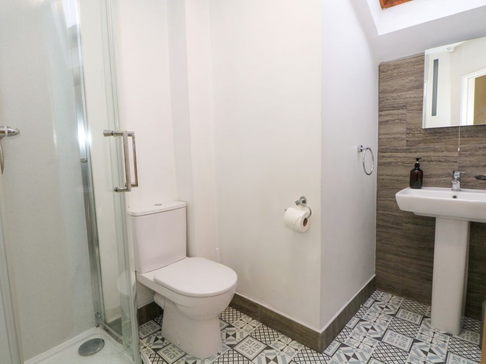 A bathroom with a shower and toilet at The Brew House in Bakewell