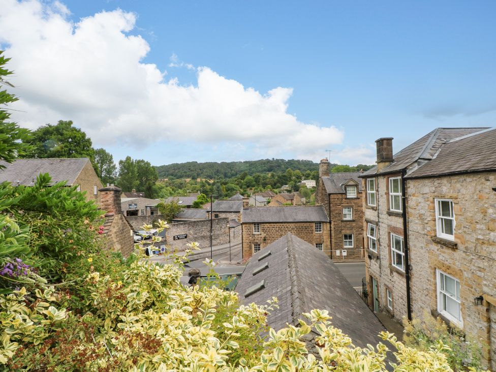 A view of buildings and greenery at The Brew House in Bakewell