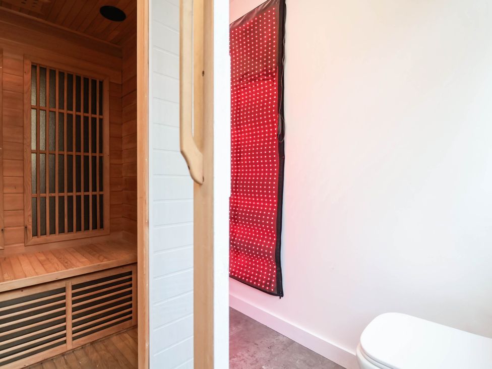 A sauna and toilet in a bathroom at 2 Makant Street Bolton