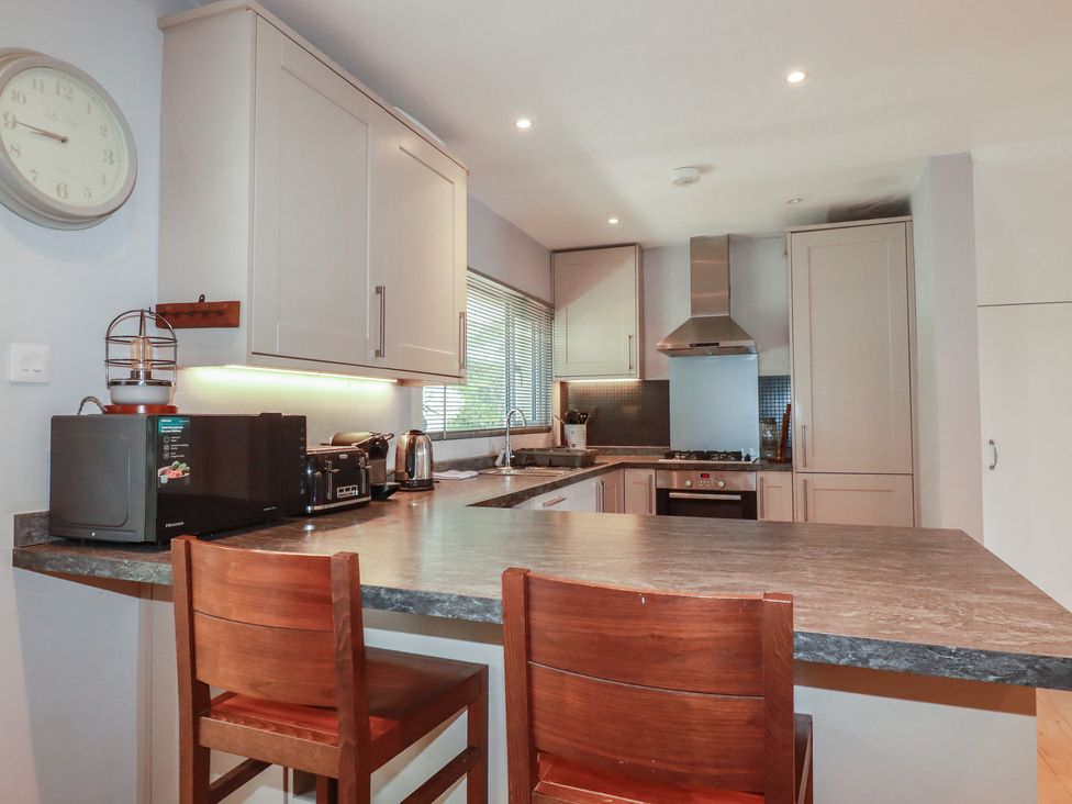 A kitchen with appliances and countertop at 1 Grenville Road Truro