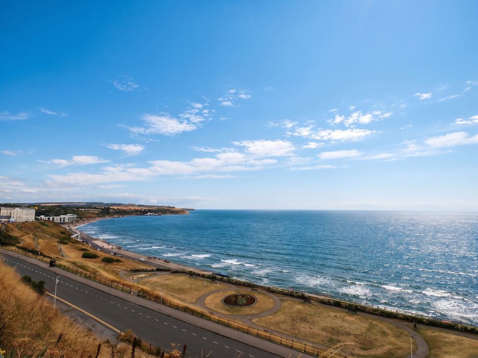 A view of the ocean and road at The Gulls Rest