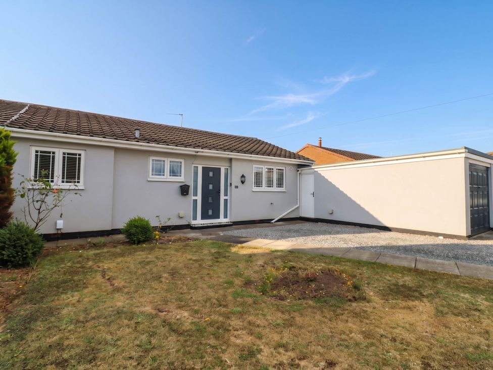A house with a front door and garden at The Greenway in Middleton St George