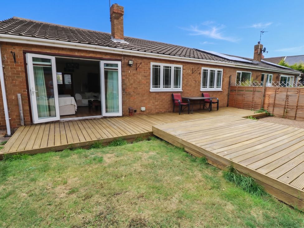 A house exterior with decking and garden at The Greenway in Middleton St George
