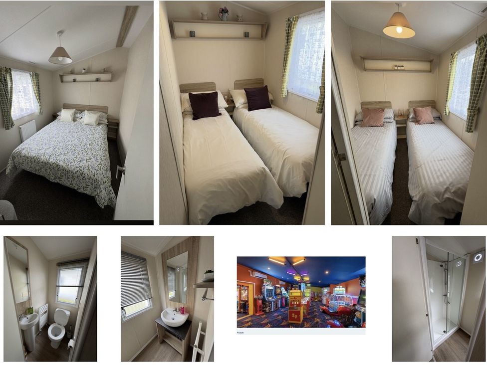 A bedroom with beds and a bathroom at Golden Sands Holiday Park in Dawlish
