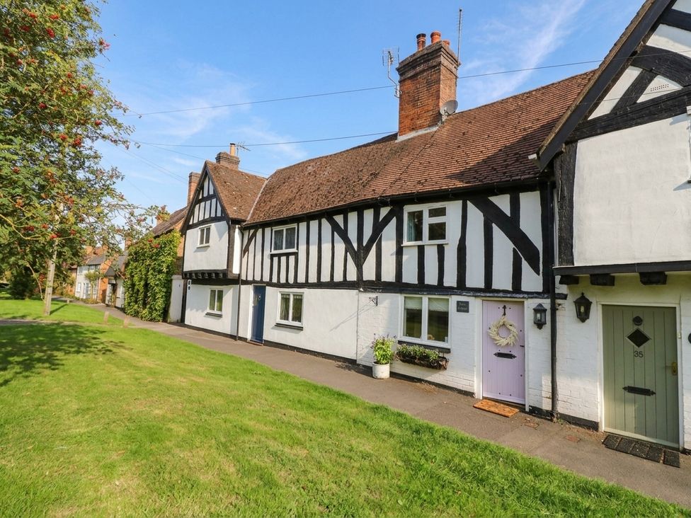 A row of houses with distinctive architecture at Lilac Cottage in Brinklow