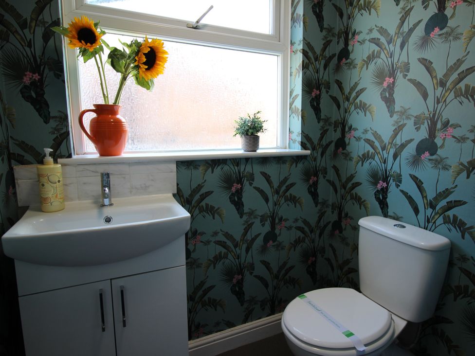 A bathroom with a sink and toilet at The Trafalgar in Scarborough