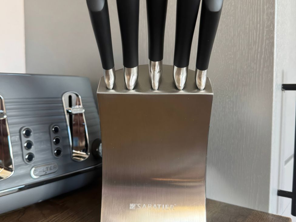 A knife block with kitchen knives at Blackburn Heights Apartment 3, Bridlington