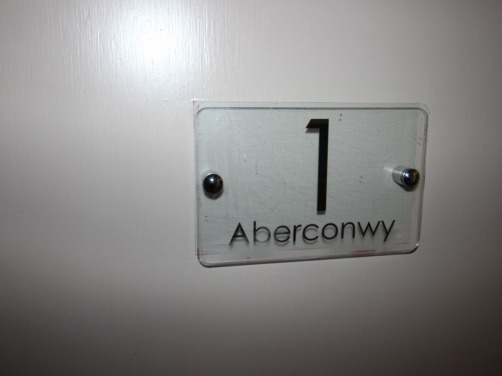 A nameplate with the number 1 and the word Aberconwy