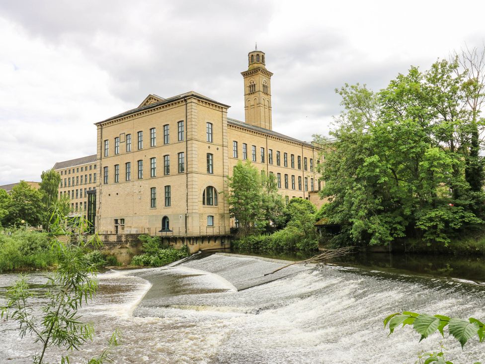 A building next to a waterfall at Canal House in Shipley