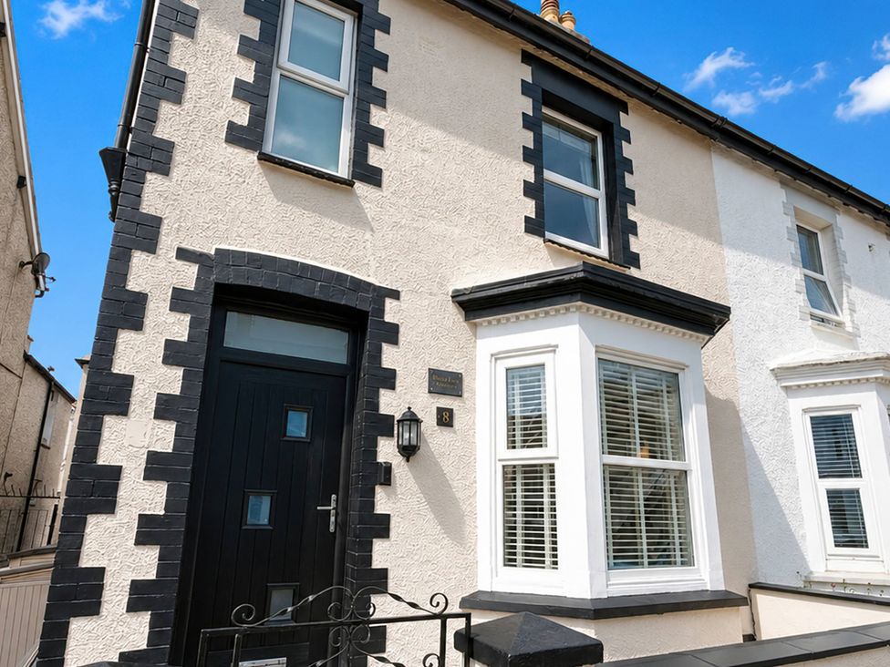 A house exterior with a front door and windows at Number 8 Llandudno