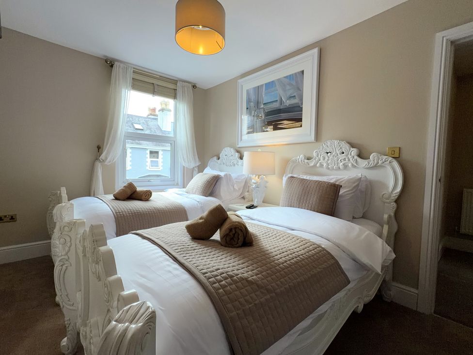 A bedroom with two beds at Number 8 Llandudno