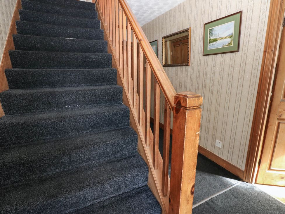 A staircase in a hallway at Prudhoe Cottage in Prudhoe