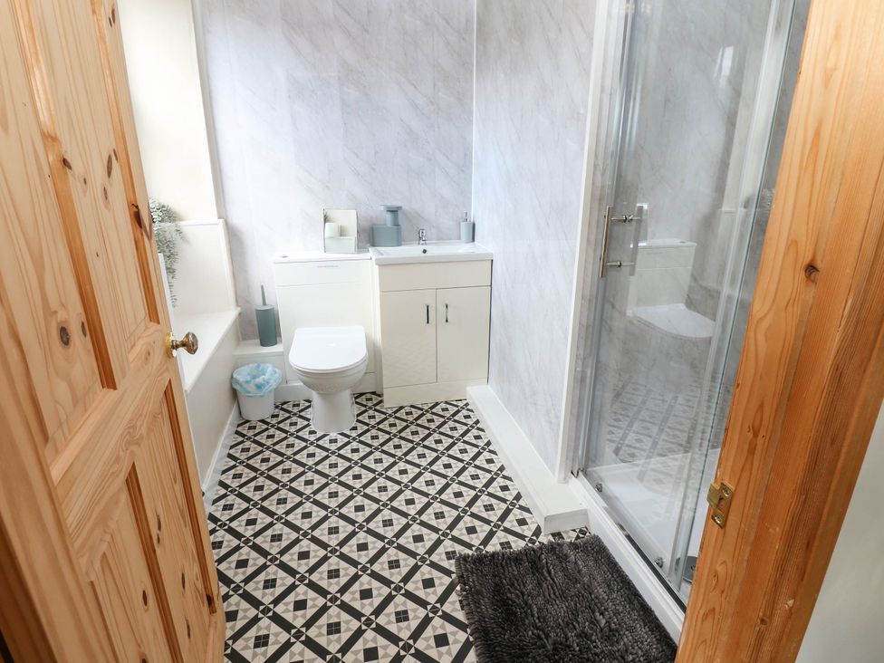 A bathroom with shower and vanity at Prudhoe Cottage in Prudhoe