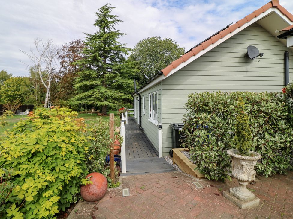 An outdoor view of a house with a pathway and garden at Jasper Lodge in Lincoln