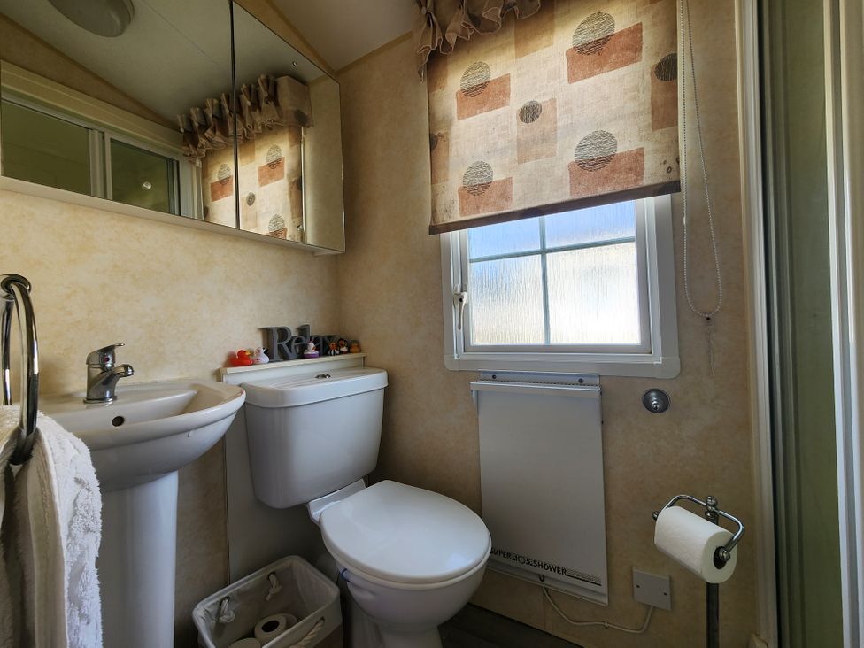 A bathroom with a sink and toilet at Whitley bay parkdean resorts - 52 Beechfield, Whitley Bay