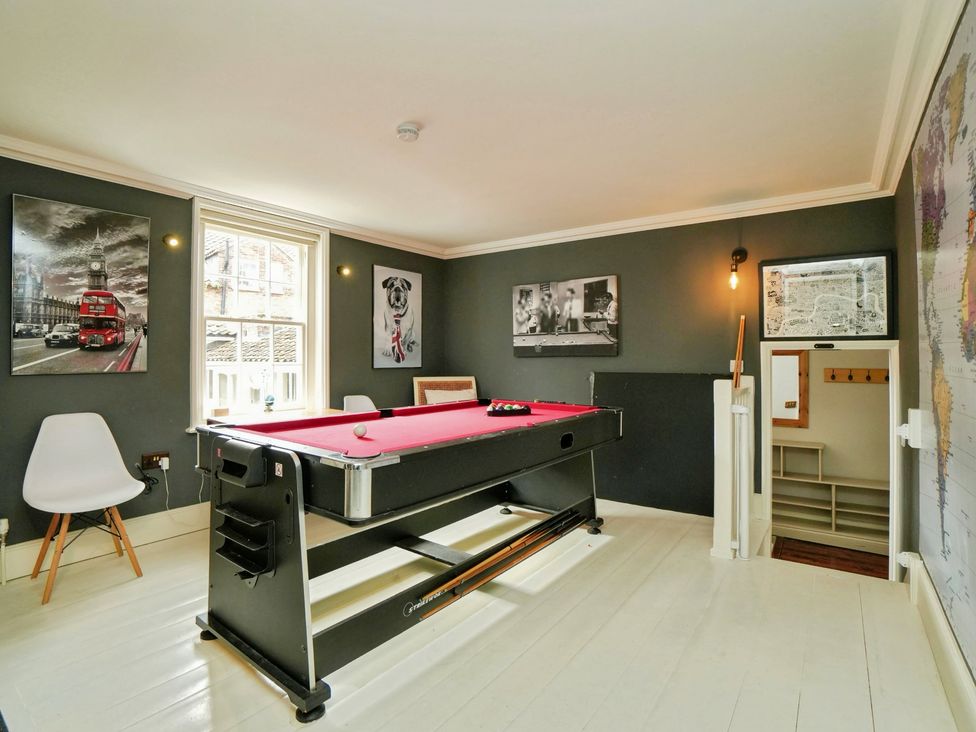 A game room featuring a pool table and wall art at Cadogan House Easingwold