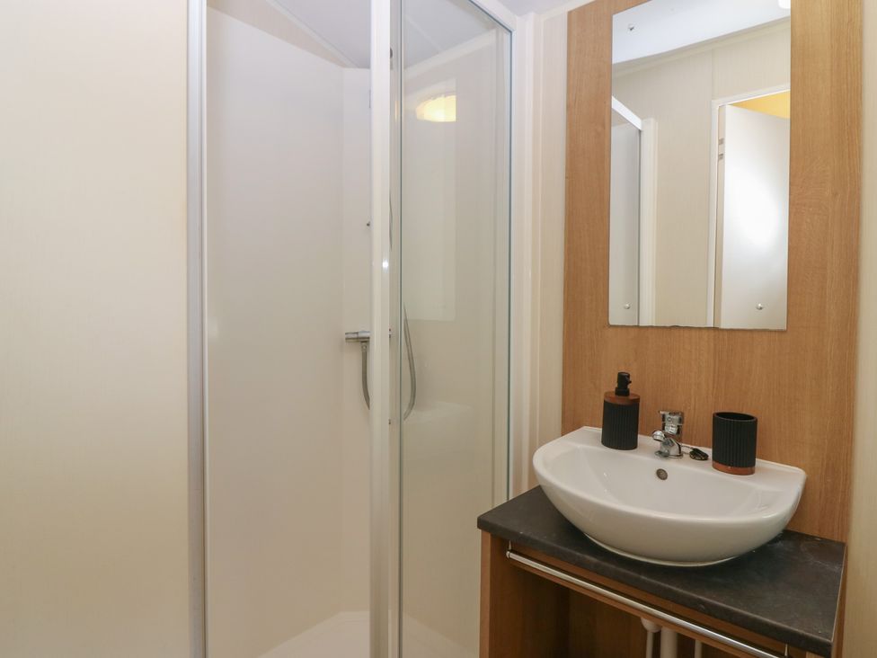 A bathroom with a shower and sink at NO. 249 in Eyemouth