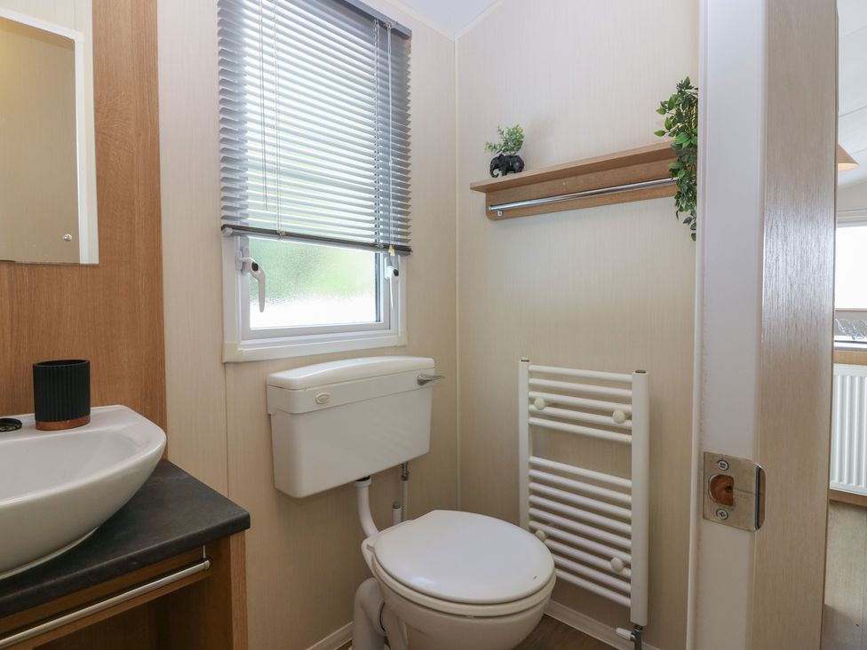 A bathroom with a sink and toilet at NO. 249 in Eyemouth
