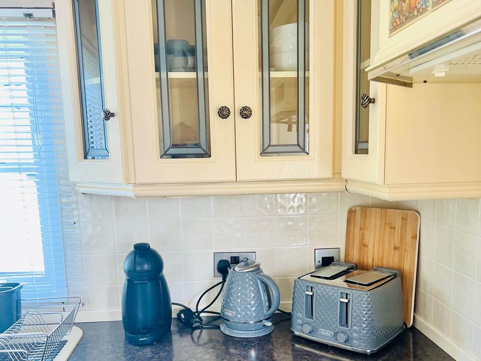 A kitchen with kettle and toaster at Sea Breeze A Beautiful 3 Bed Pet Friendly Retreat Mablethorpe