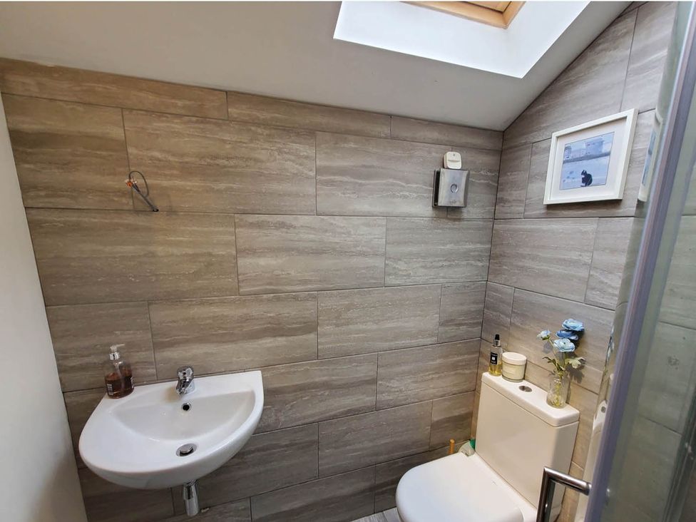 A bathroom with a sink and toilet at 3 Bedroom Cottage Hot Tub Garden Parking Dunkeswell