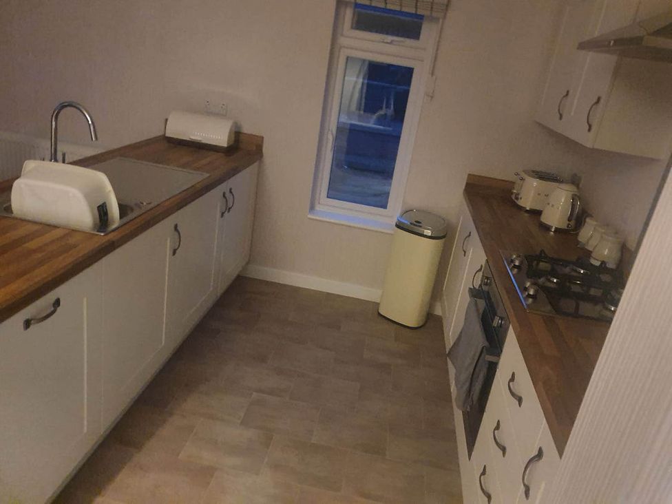 A kitchen with a sink and gas stove at Pet Friendly 2Bed Luxury Lodge in Routh HotTub